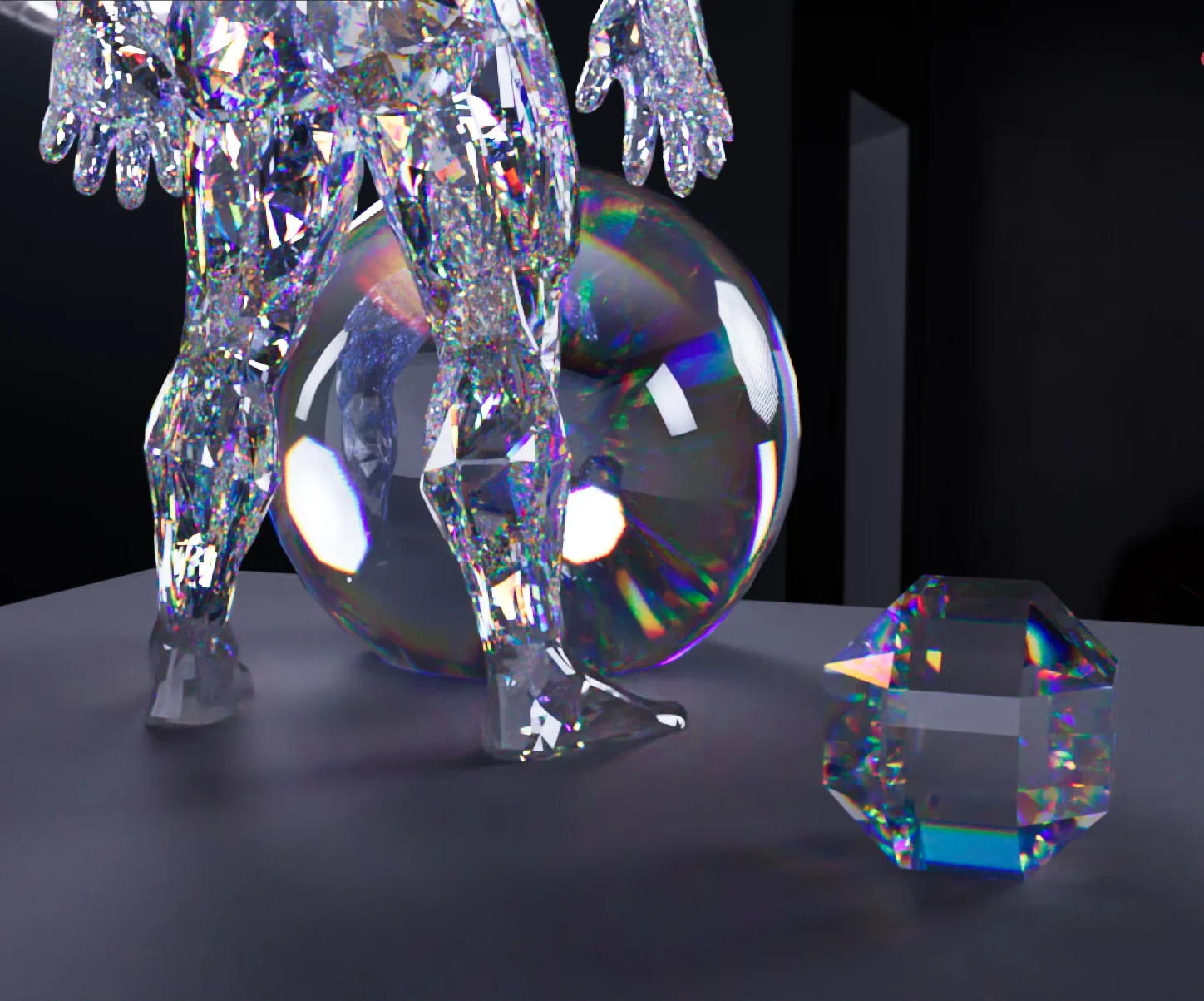 A crystal figure, a soap bubble and a cut gem, rendered by Spectra with rainbow dispersion through the glass